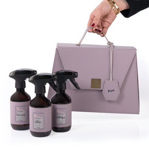 purple bag contains three different room sprays with customizes name label 