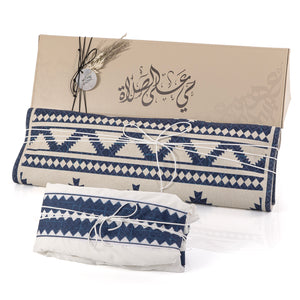 set of blue prayer carpet with matching prayer dress 