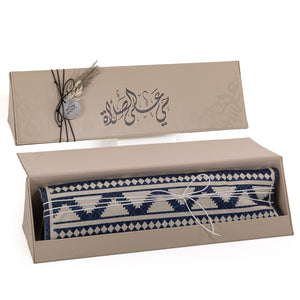 set of blue prayer carpet with matching prayer dress 