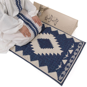 set of blue prayer carpet with matching prayer dress 