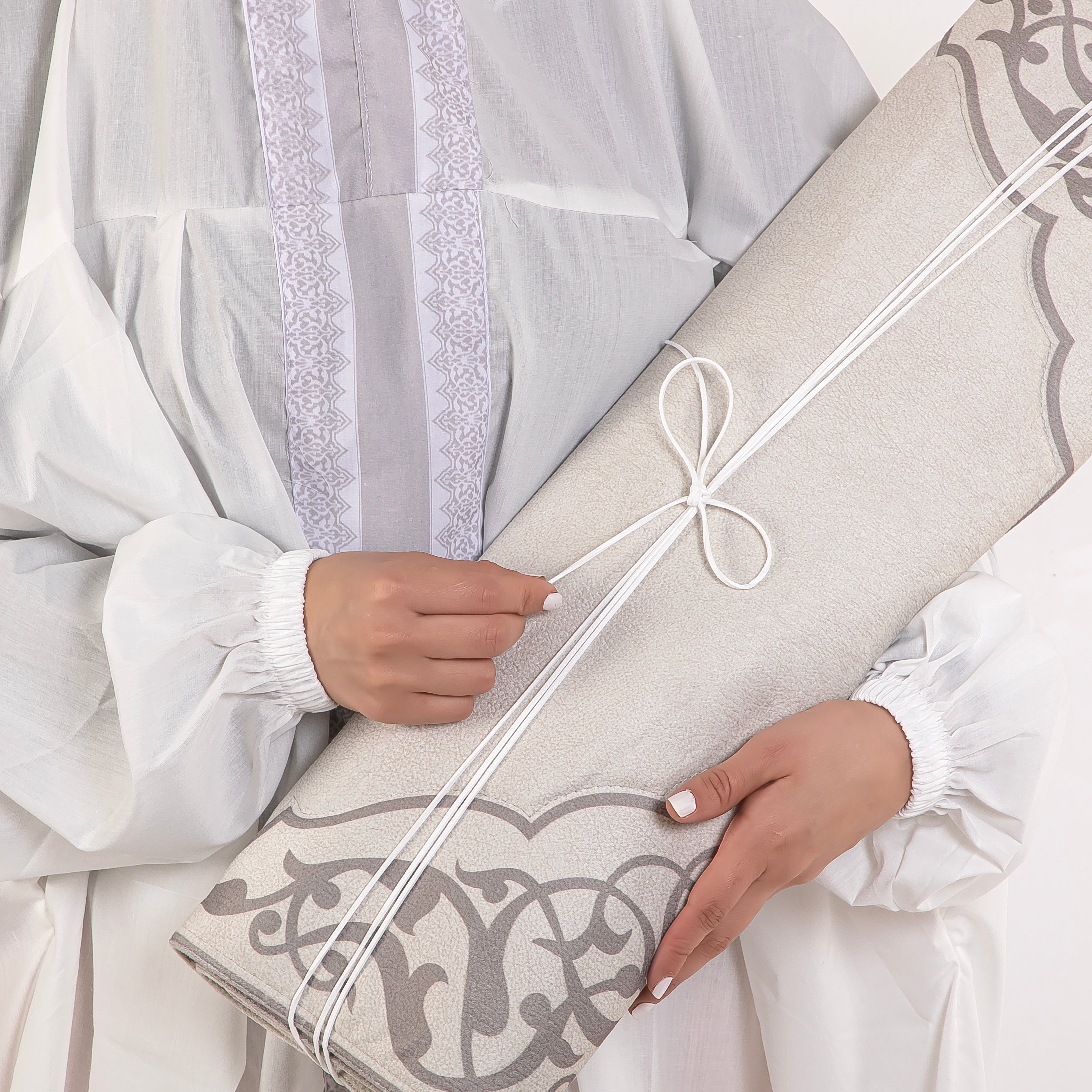 set of grey prayer carpet with matching prayer dress 