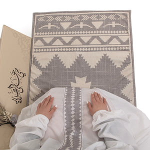 set of grey prayer carpet with matching prayer dress 