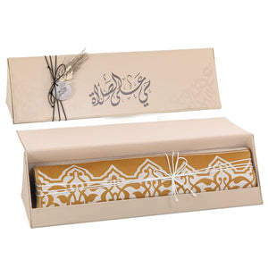 set of beige prayer carpet with matching prayer dress 