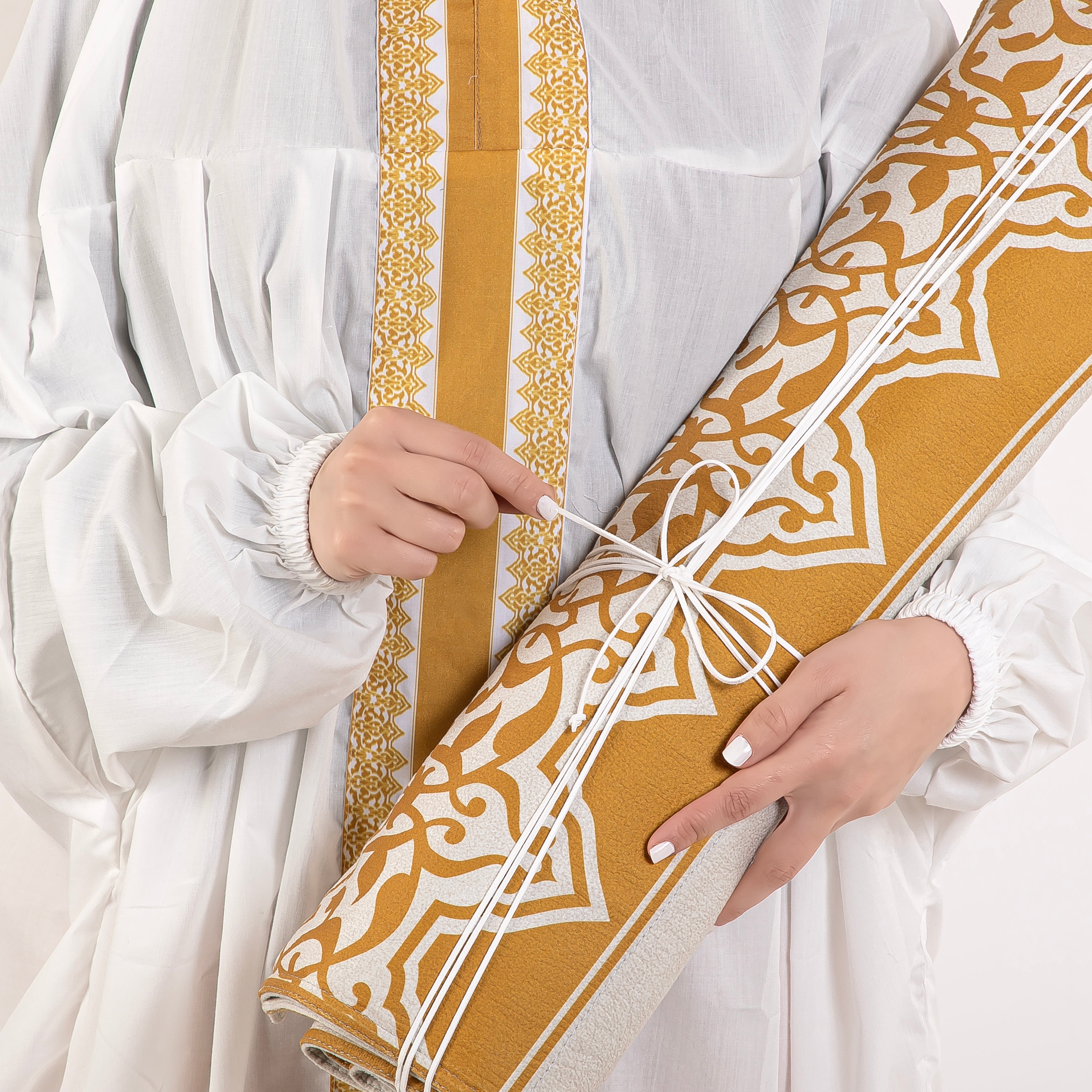 set of beige prayer carpet with matching prayer dress 