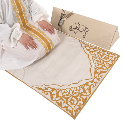 set of beige prayer carpet with matching prayer dress 