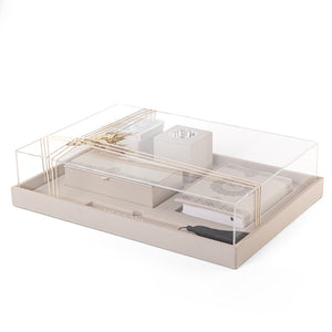 A beige set contains Quraan, incense burner, box, bakhor box, and bookmark in an acrylic box