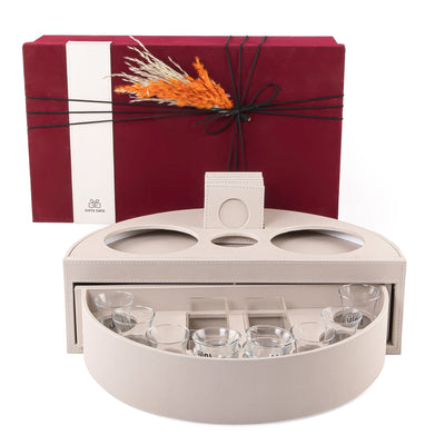 Grey leather set of circular stand contains six tea glasses, six coffee glasses, six coasters