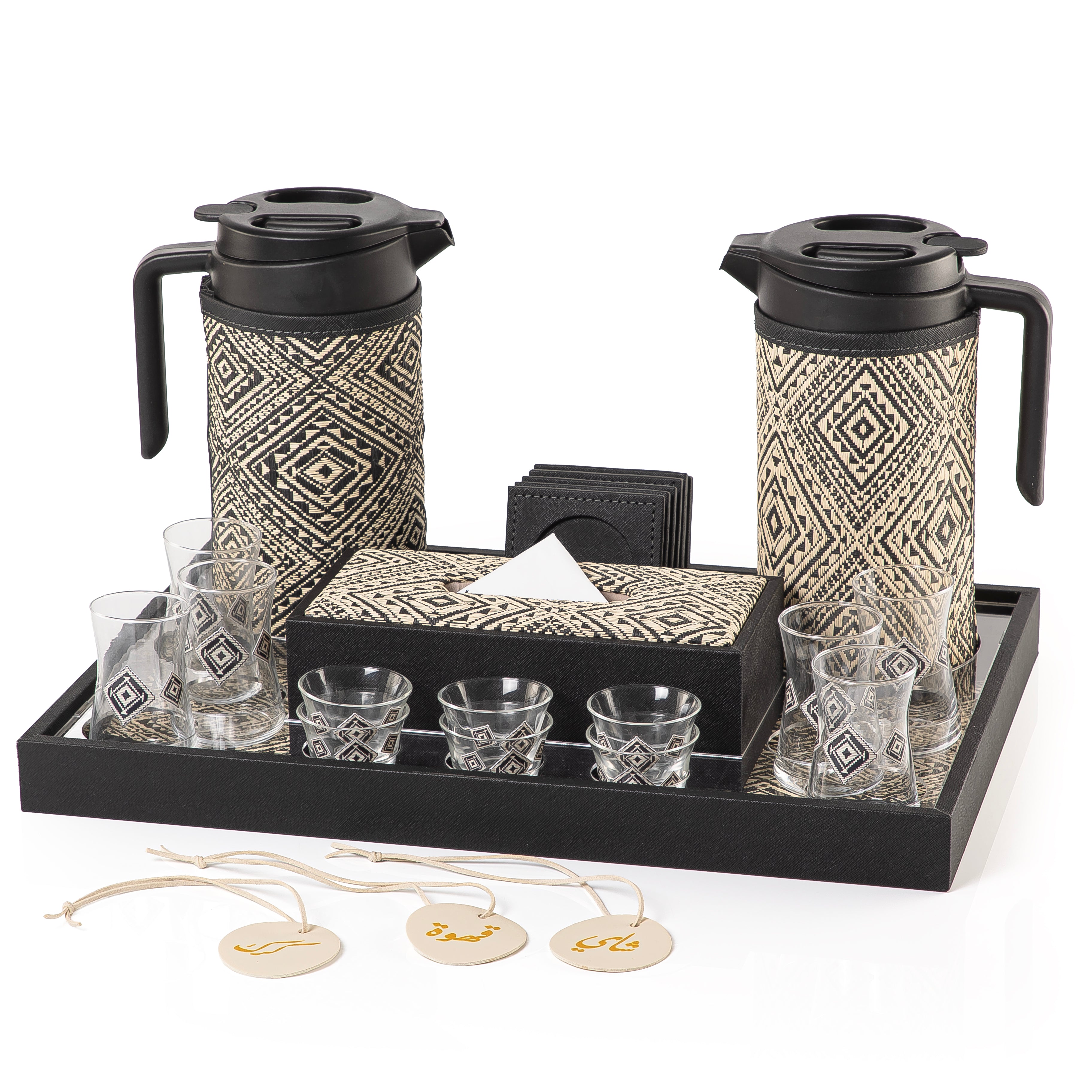 A black tray holding two thermoses with fabric covers, six coffee glasses, six tea glasses, six coasters, three labels "Tea, Karak, Coffee", and tissue box