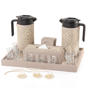 A grey tray holding two thermoses with fabric covers, six coffee glasses, six tea glasses, six coasters, three labels "Tea, Karak, Coffee", and tissue box