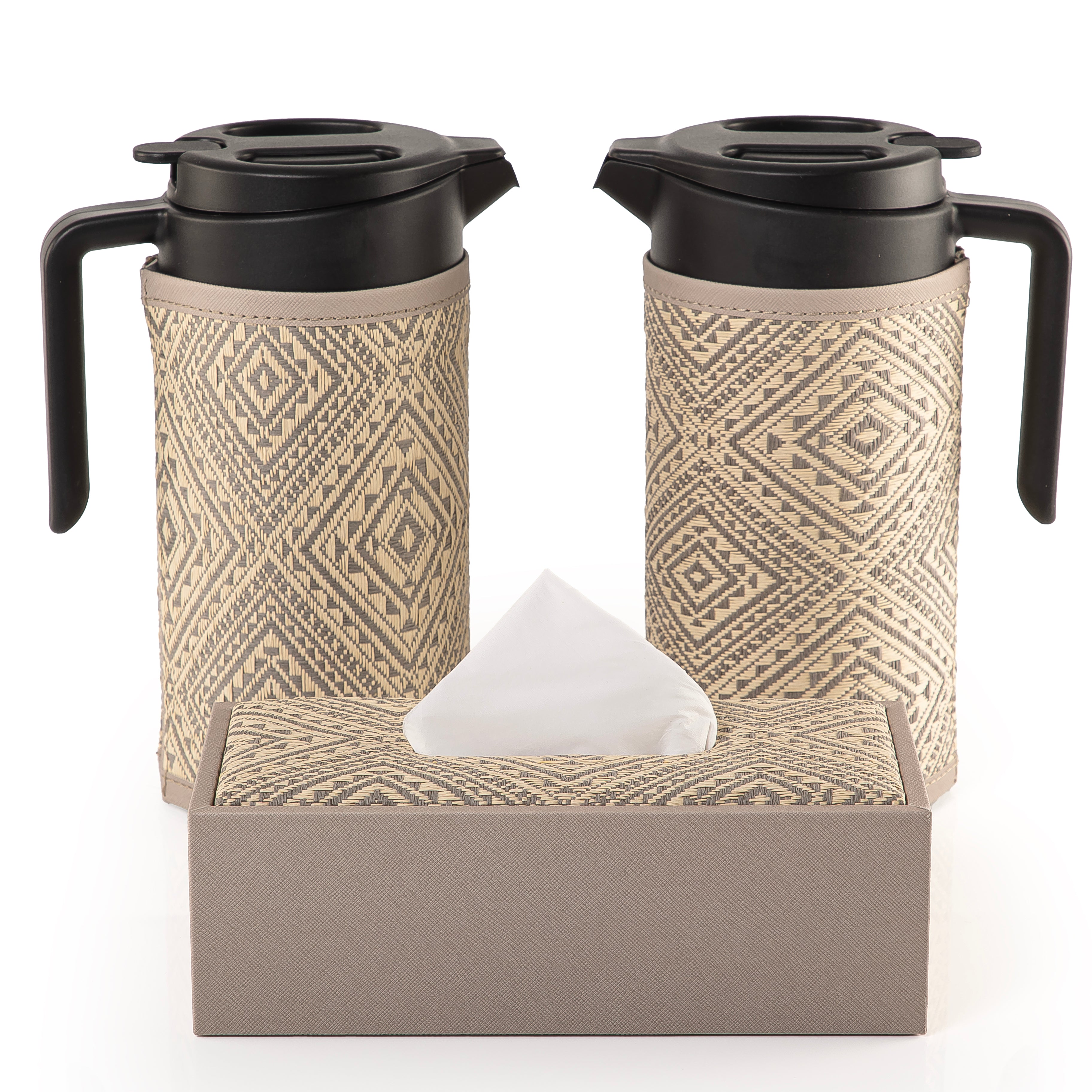 two thermoses with grey fabric covers and tissue box