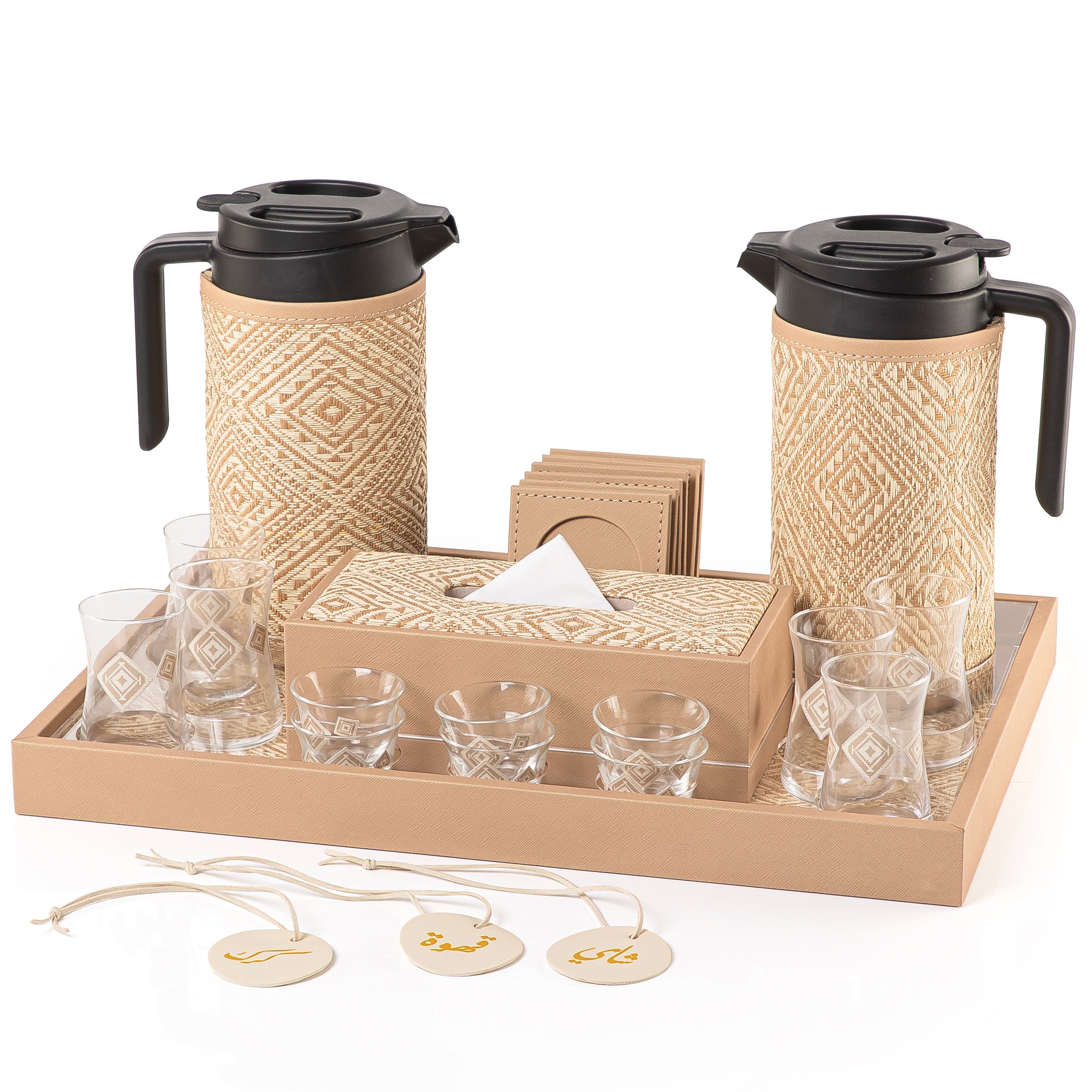 A beige tray holding two thermoses with fabric covers, six coffee glasses, six tea glasses, six coasters, three labels "Tea, Karak, Coffee", and tissue box