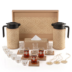 A beige tray holding two thermoses with fabric covers, six coffee glasses, six tea glasses, six coasters, three labels "Tea, Karak, Coffee", and tissue box