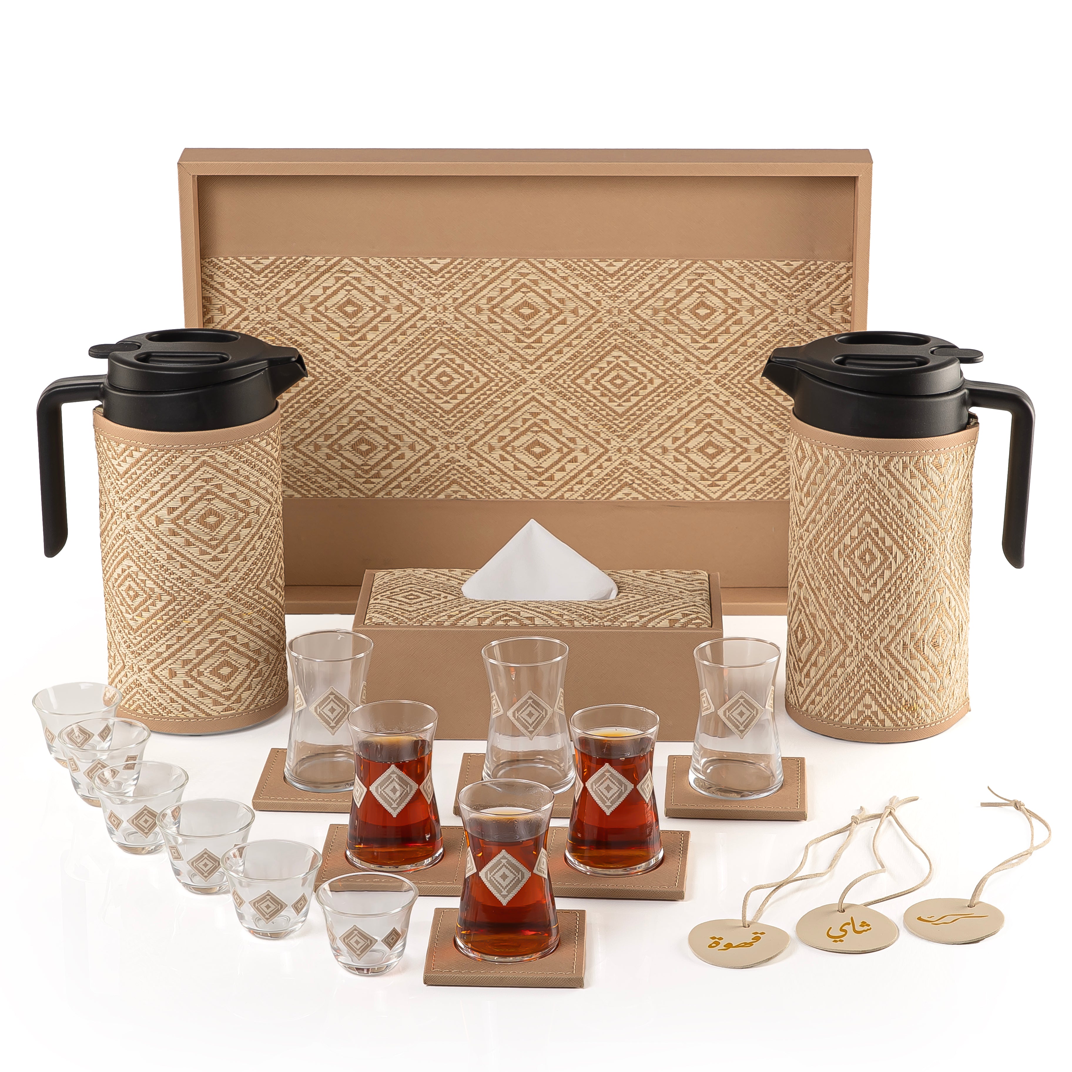 A beige tray holding two thermoses with fabric covers, six coffee glasses, six tea glasses, six coasters, three labels "Tea, Karak, Coffee", and tissue box