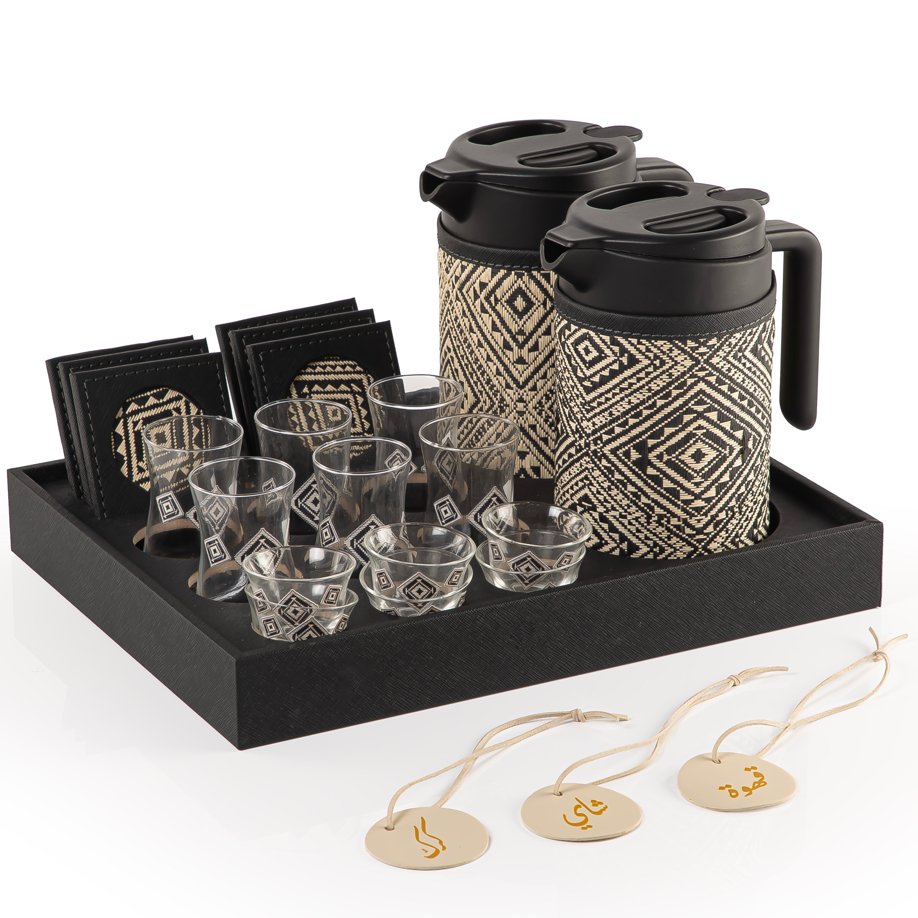 A black tray holding two thermoses with fabric covers, six coffee glasses, six tea glasses, six coasters, three labels "Tea, Karak, Coffee"