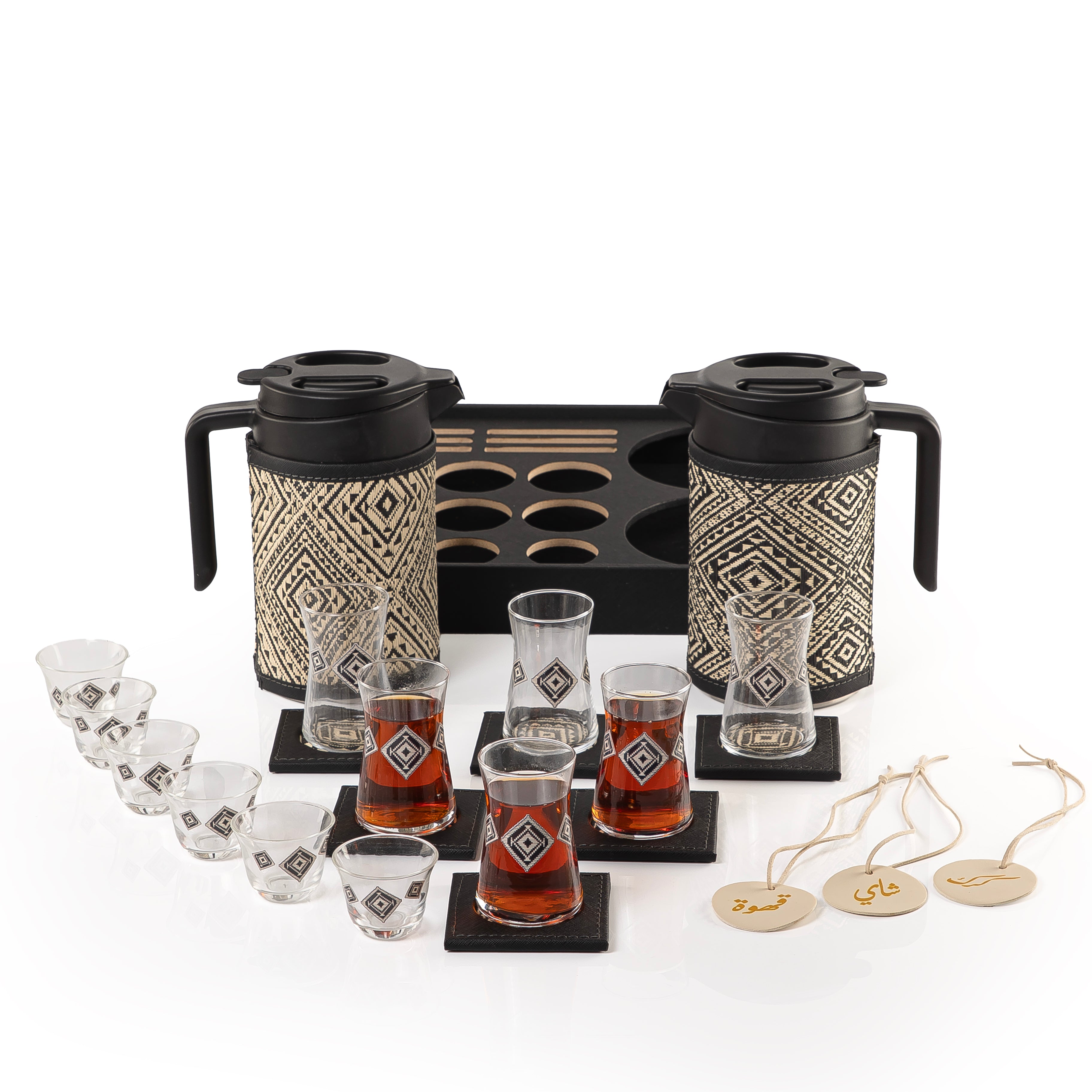 A black tray holding two thermoses with fabric covers, six coffee glasses, six tea glasses, six coasters, three labels "Tea, Karak, Coffee"