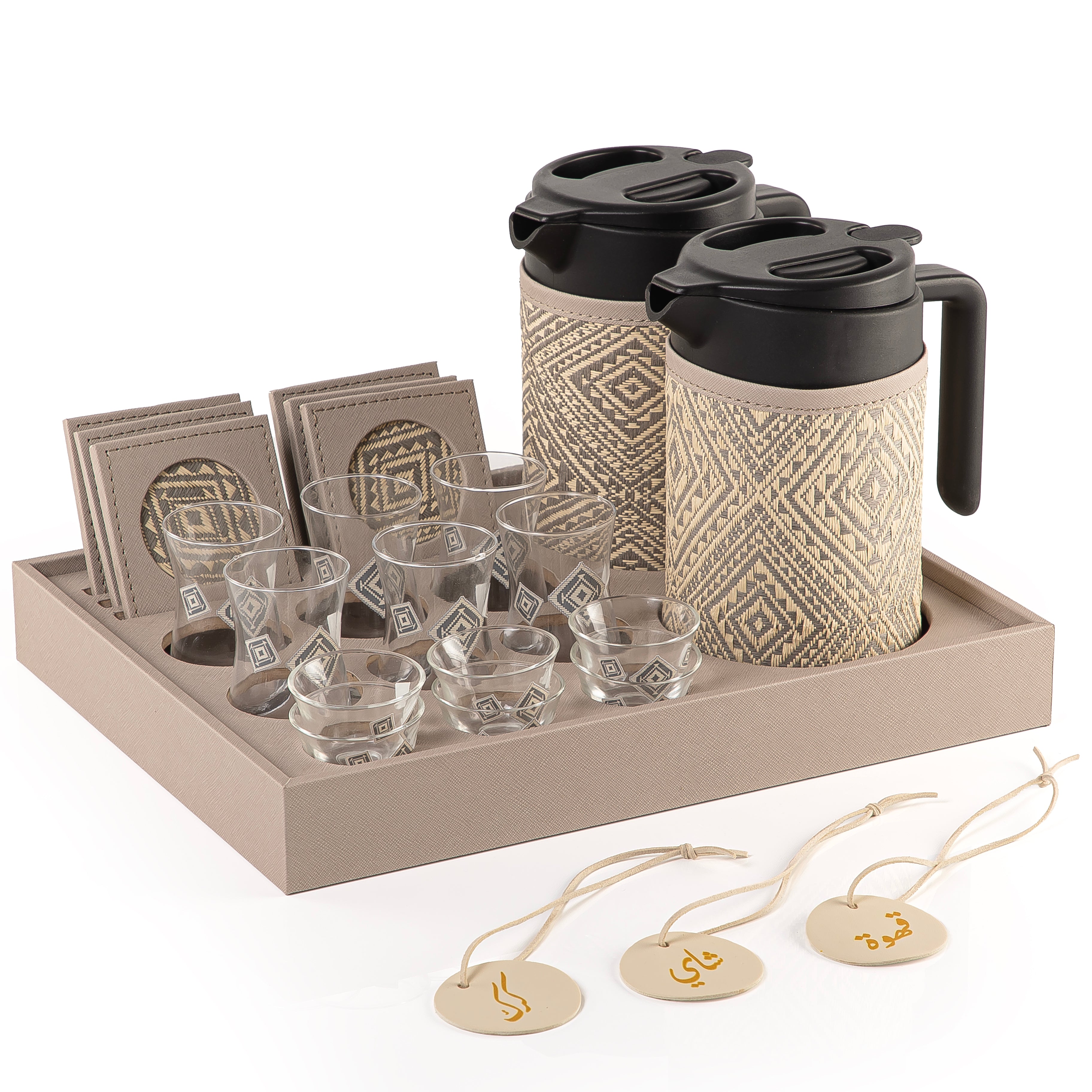 A grey tray holding two thermoses with  fabric covers, six coffee glasses, six tea glasses, six coasters, three labels "Tea, Karak, Coffee"