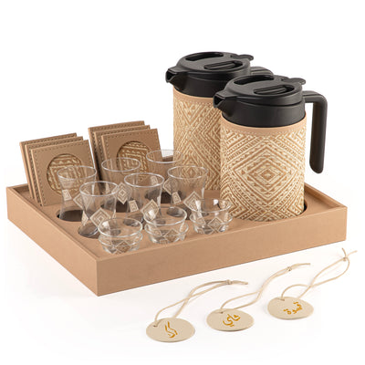A beige tray holding two thermoses with  fabric covers, six coffee glasses, six tea glasses, six coasters, three labels "Tea, Karak, Coffee"
