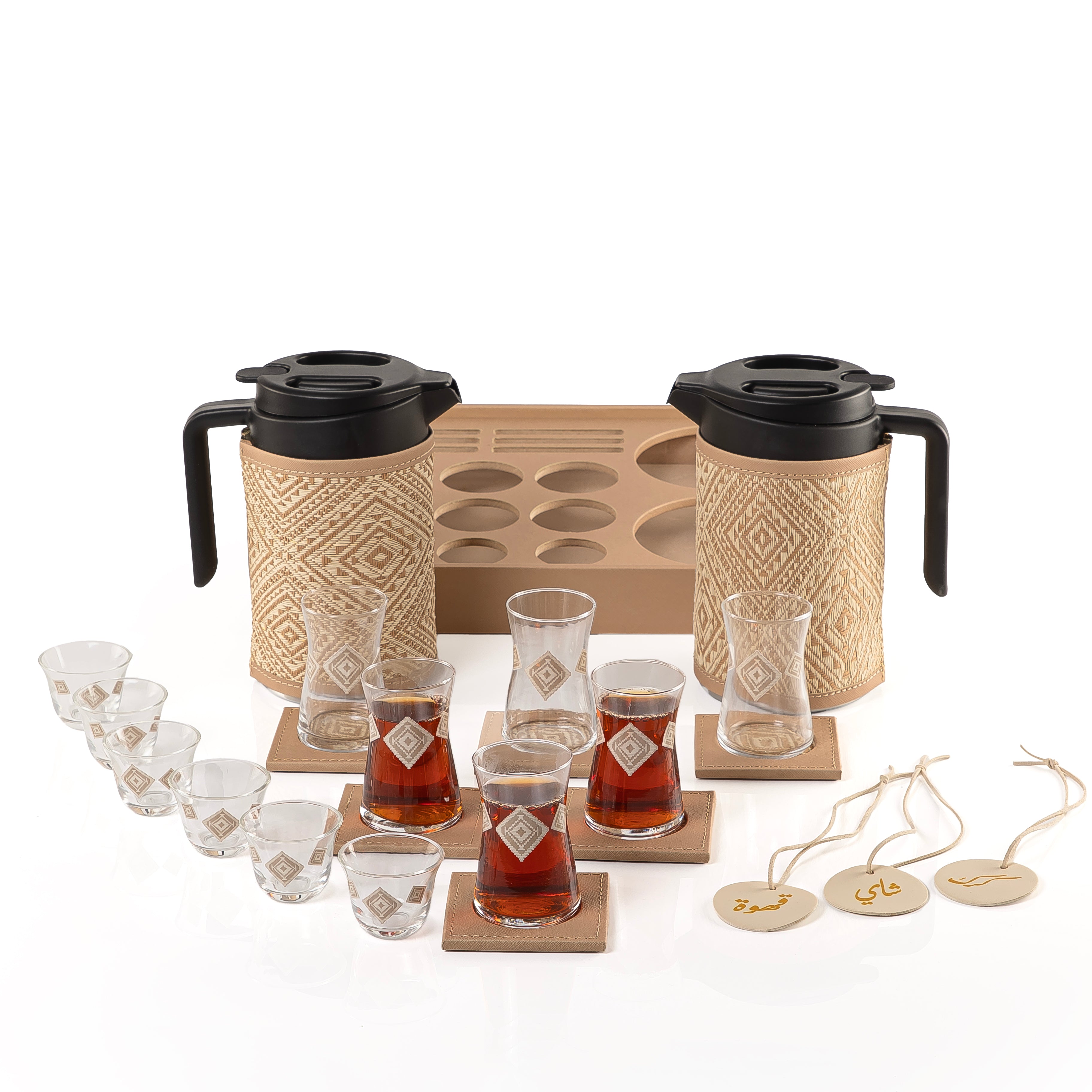 A beige tray holding two thermoses with  fabric covers, six coffee glasses, six tea glasses, six coasters, three labels "Tea, Karak, Coffee"