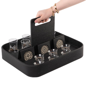 A black stand with a handle, holding six coffee glasses, six tea glasses, and six coasters