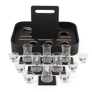 A black stand with a handle, holding six coffee glasses, six tea glasses, and six coasters