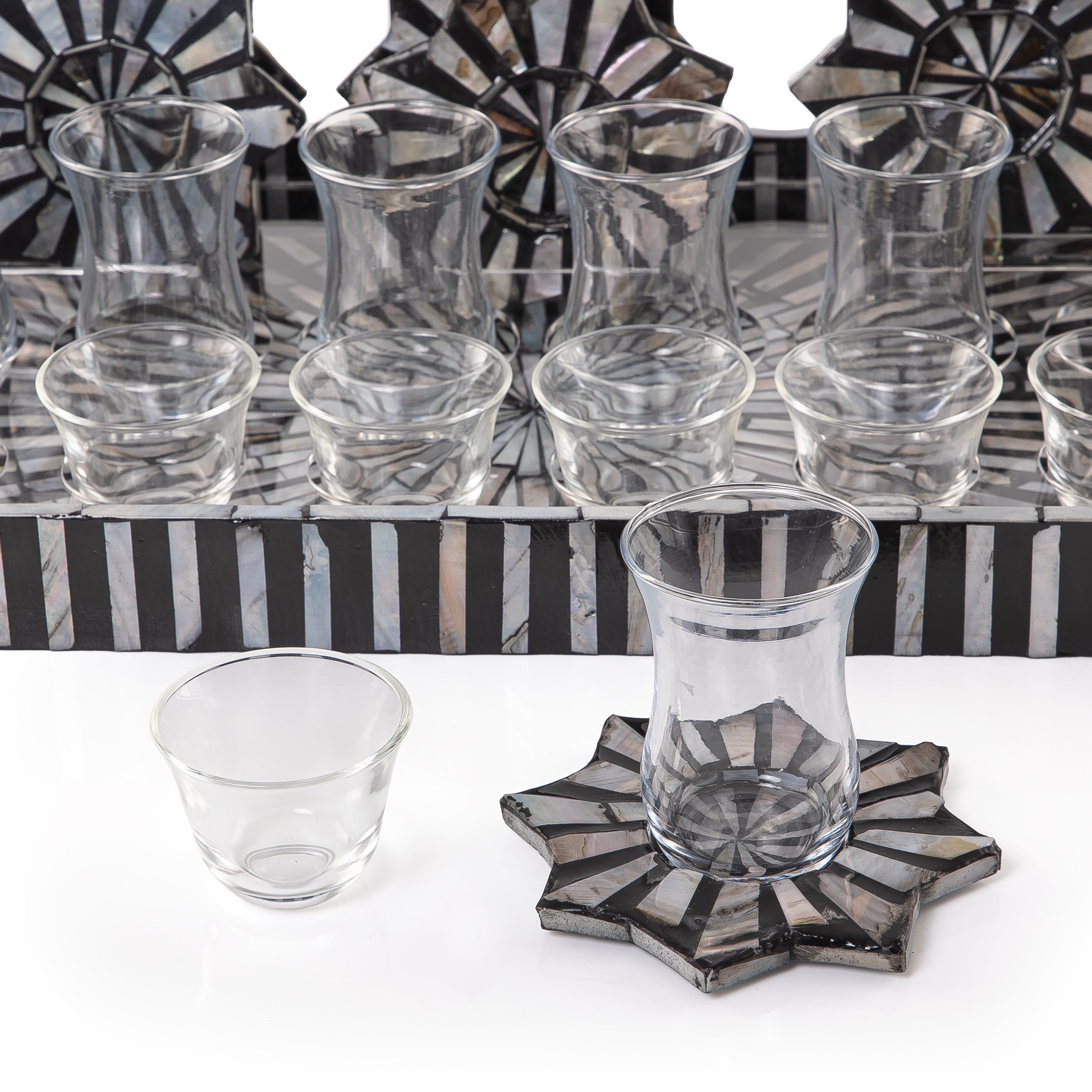 A black MOP tray holding six coffee glasses, six tea glasses, and six coasters, with an acrylic box
