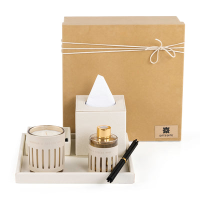 Off-white leather tray with matching tissue box, plate, candle, and diffuser