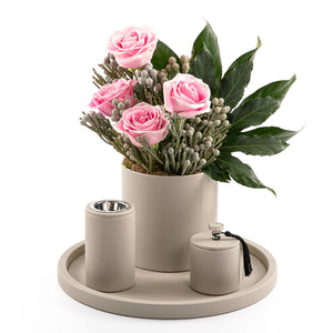 A grey leather set includes circle tray, incense burner, jar, and flower vase