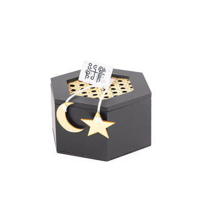 Decorated black wooden box with a customized name label 