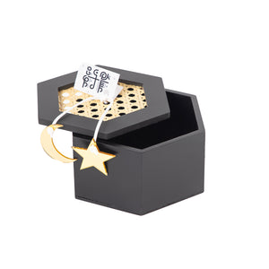 Decorated black wooden box with a customized name label 