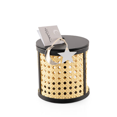 Decorated black wooden box with a customized name label 