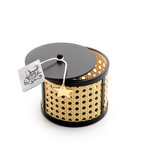 Decorated black wooden box with a customized name label 