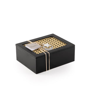 Decorated black rectangular wooden box with a customized name label 