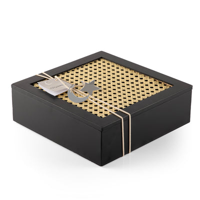 Decorated black square wooden box with a customized name label 