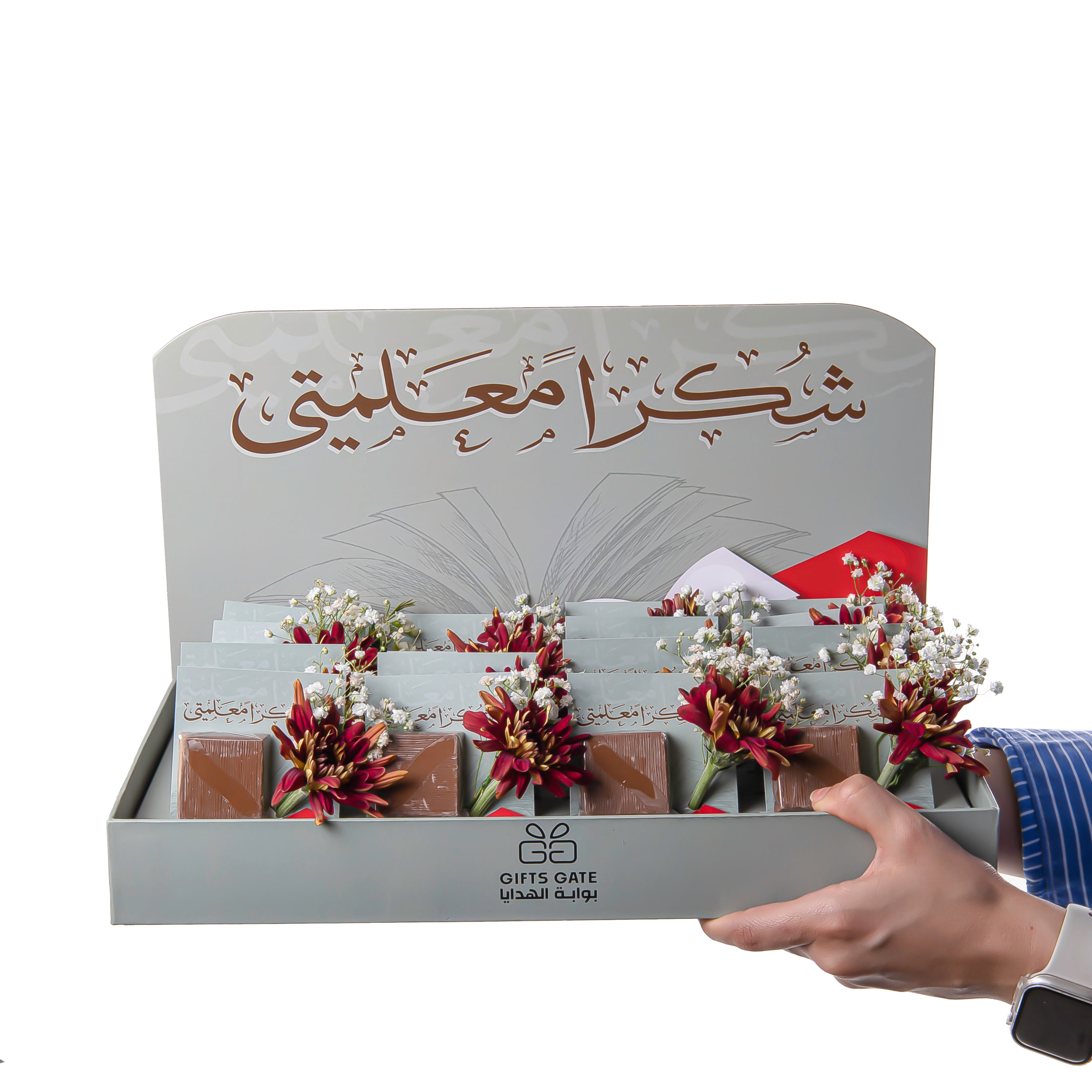 box of chocolate decorated with flower