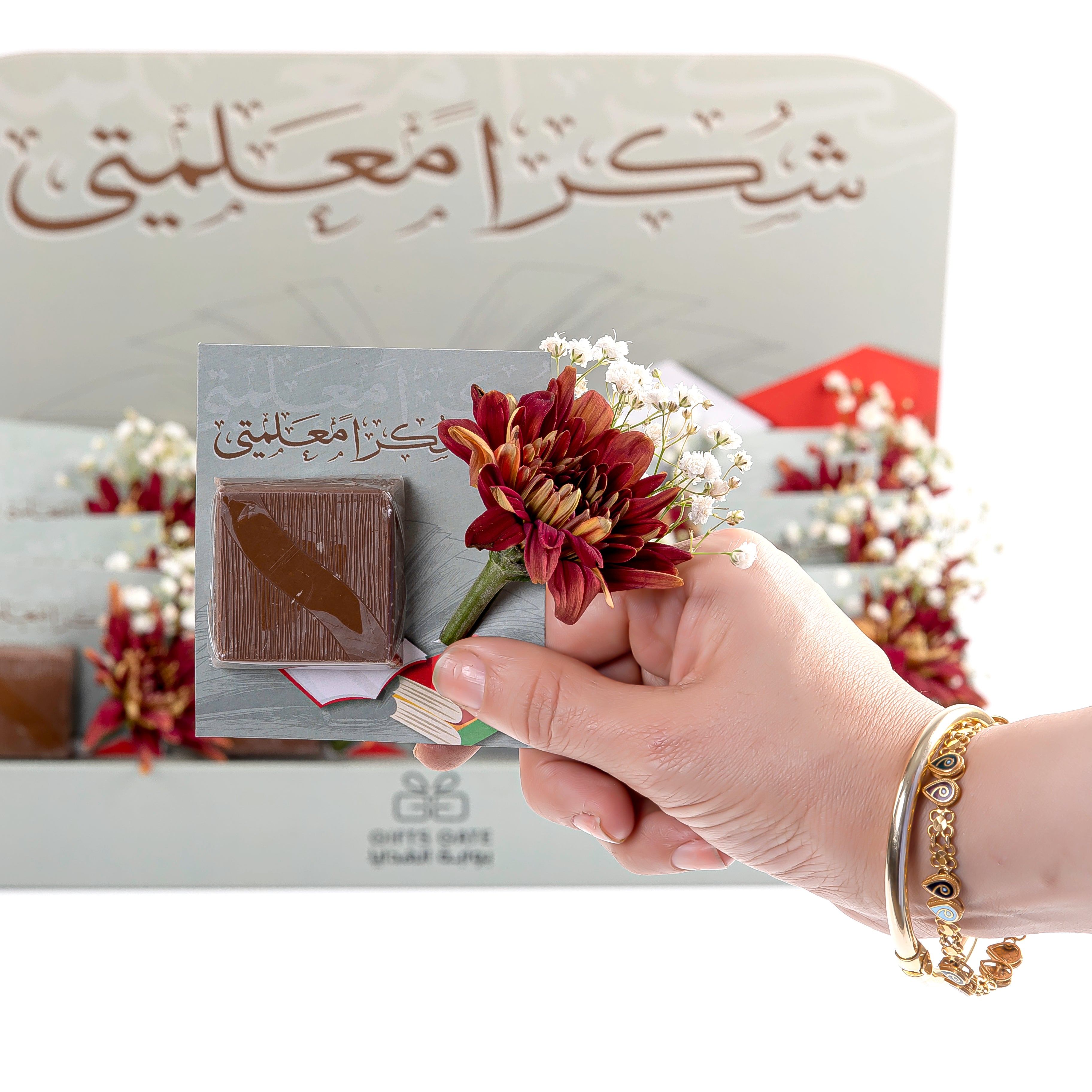 box of chocolate decorated with flower
