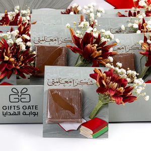 box of chocolate decorated with flower