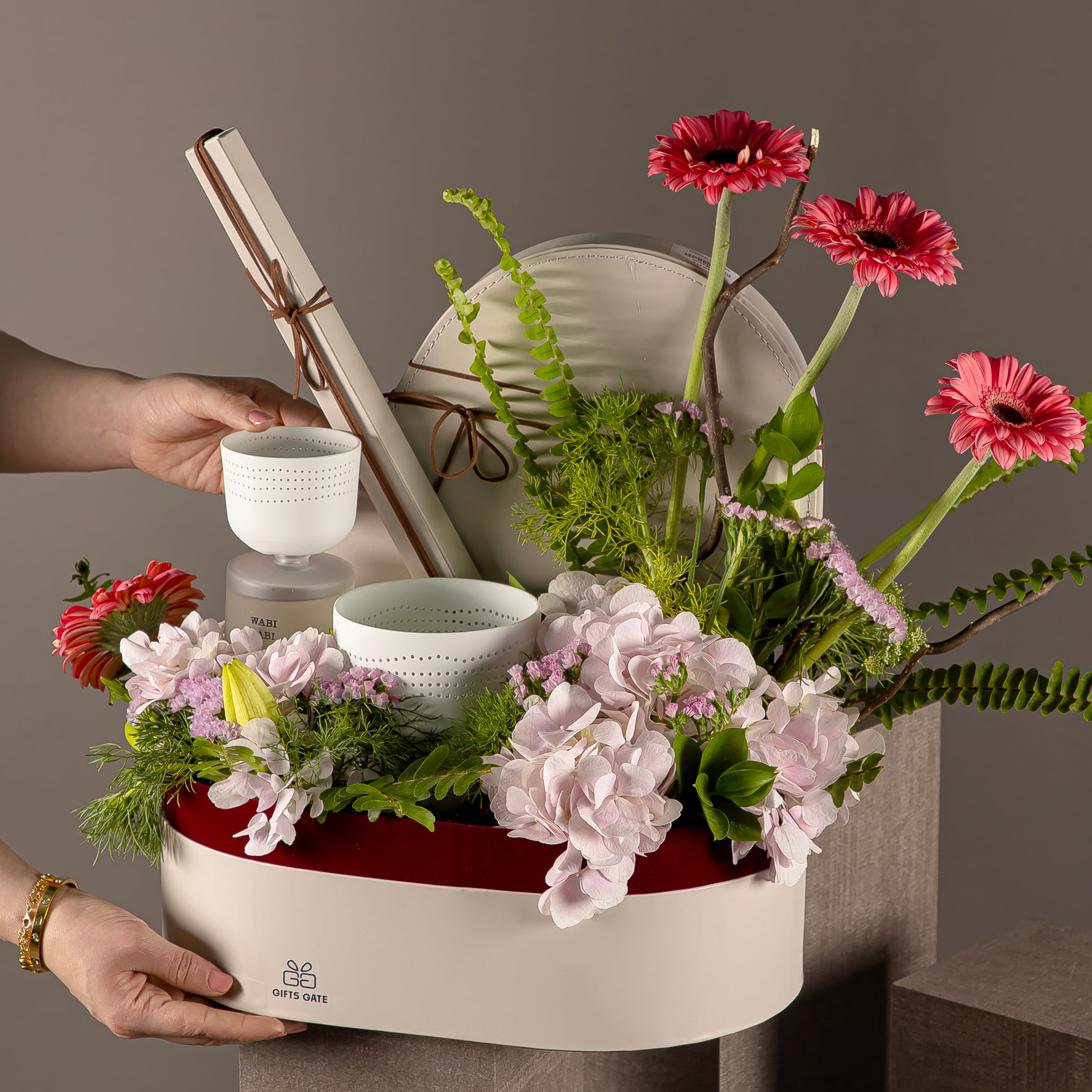 flower bouquet with luxury diffuser and candle