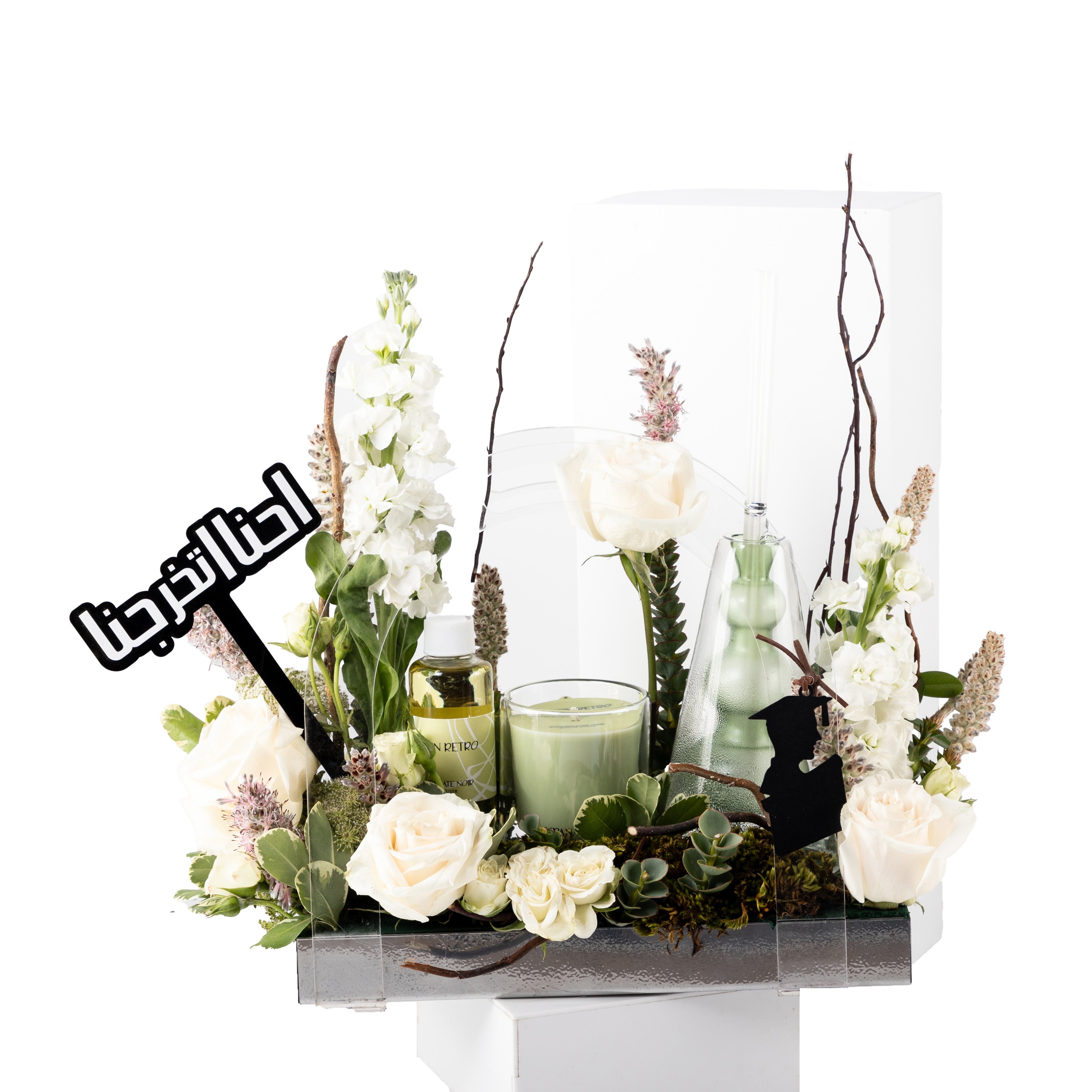 باقة زهور التخرج مع دفيوزر وشمعة