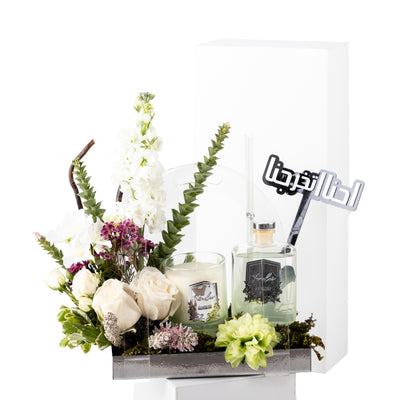 باقة زهور التخرج مع دفيوزر وشمعة