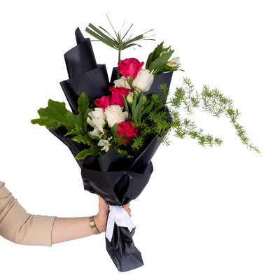 Elegant hand-tied bouquet featuring fresh deferent types of flowers -white ad red roses