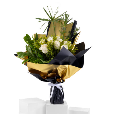 Elegant hand-tied bouquet featuring fresh deferent types of flowers
