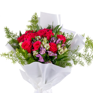 Elegant hand-tied bouquet featuring fresh deferent types of flowers
