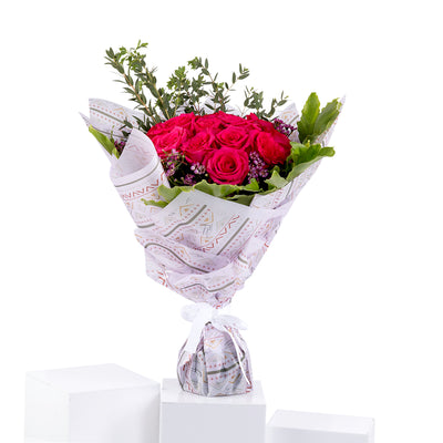 Elegant hand-tied bouquet featuring fresh deferent types of flowers