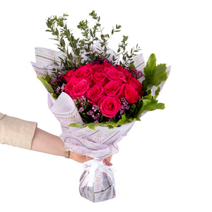 Elegant hand-tied bouquet featuring fresh deferent types of flowers
