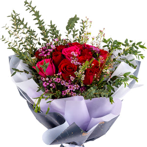 Elegant hand-tied bouquet featuring fresh deferent types of flowers