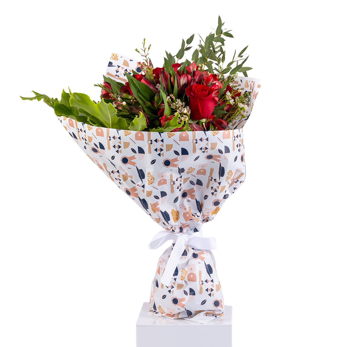 Elegant hand-tied bouquet featuring fresh red roses