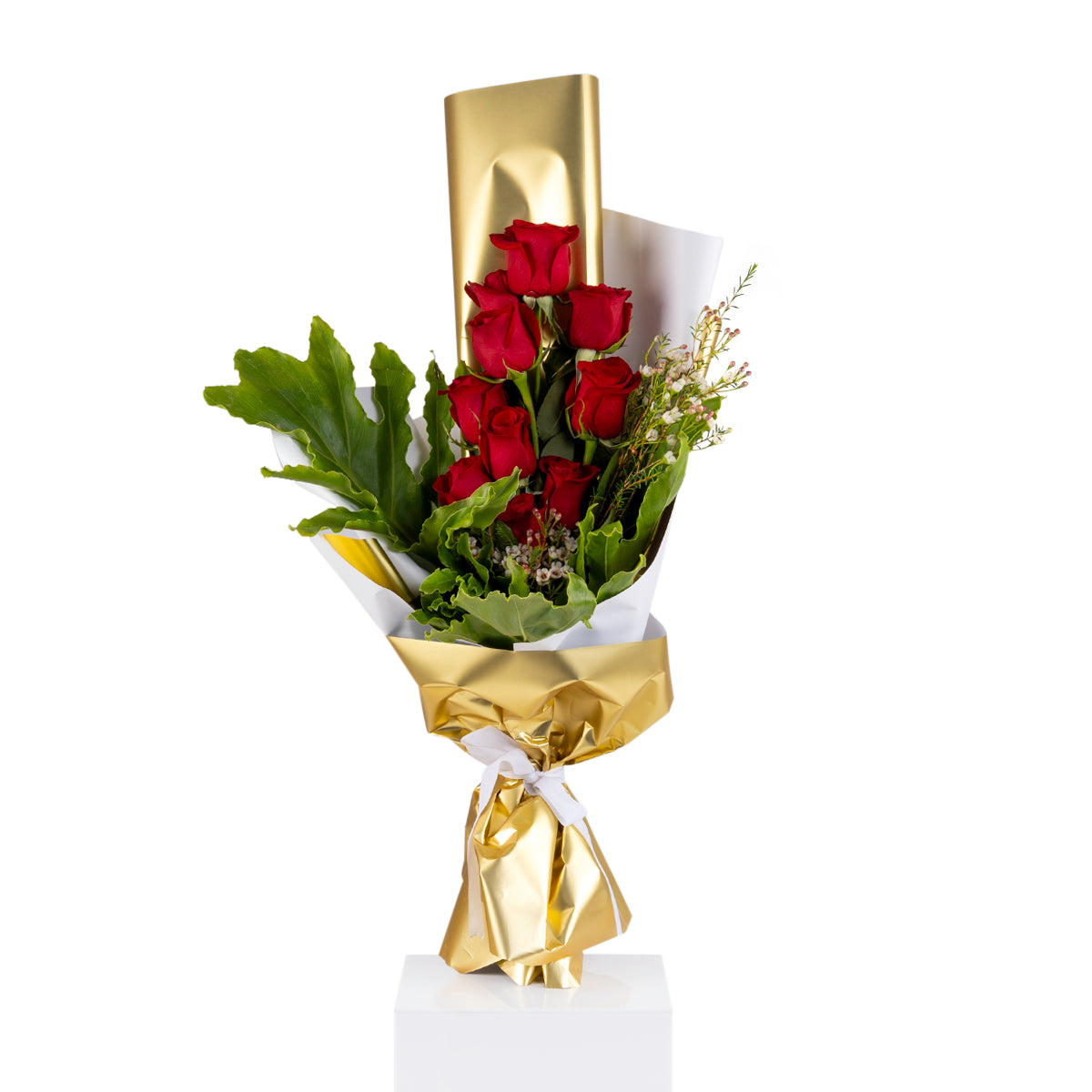 Elegant hand-tied bouquet featuring fresh red roses