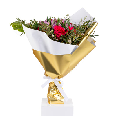 Elegant hand-tied bouquet featuring fresh deferent types of flowers