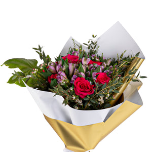 Elegant hand-tied bouquet featuring fresh deferent types of flowers