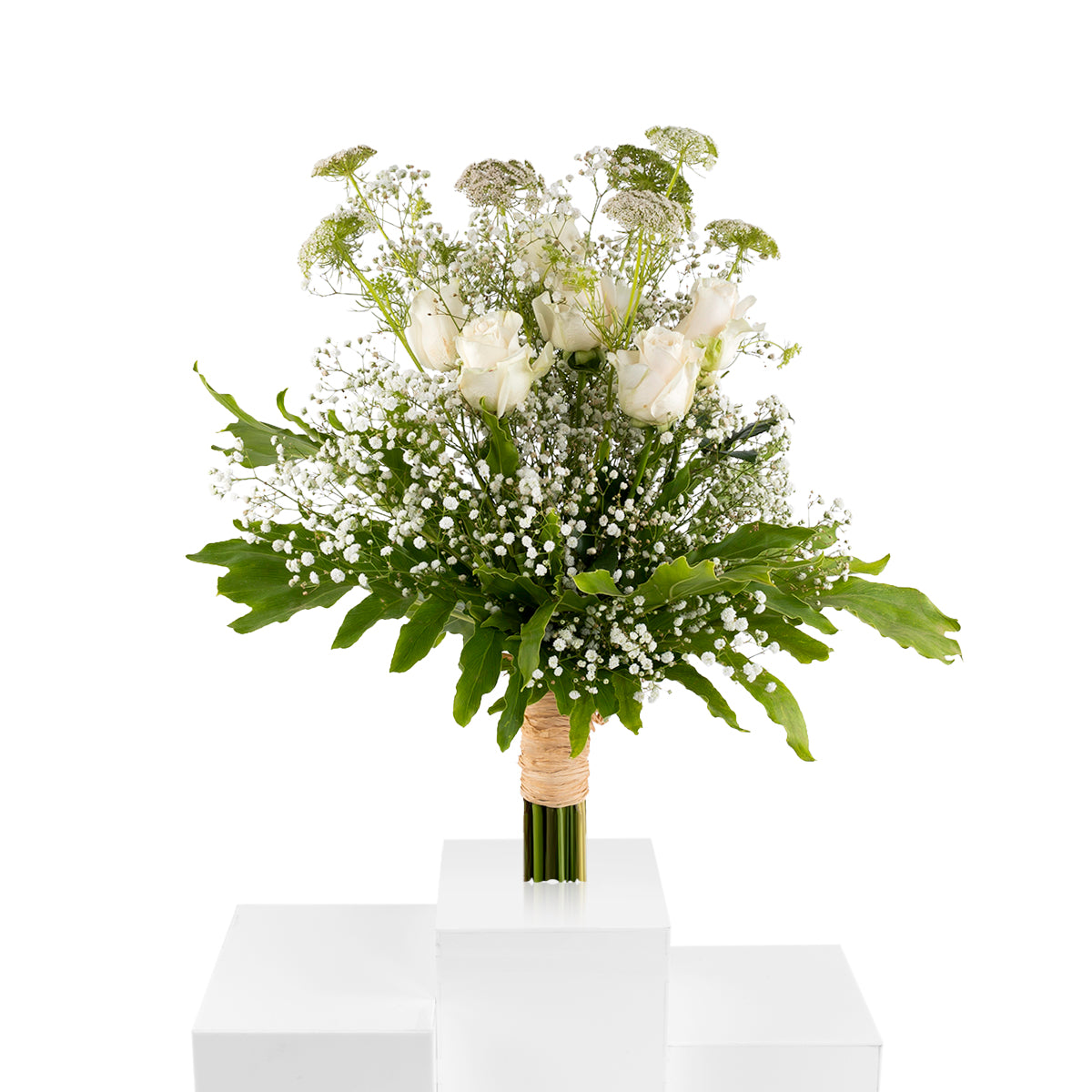Elegant hand-tied bouquet featuring fresh deferent types of white flower and roses